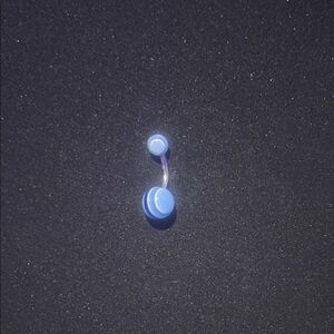 Blue striped navel peircing